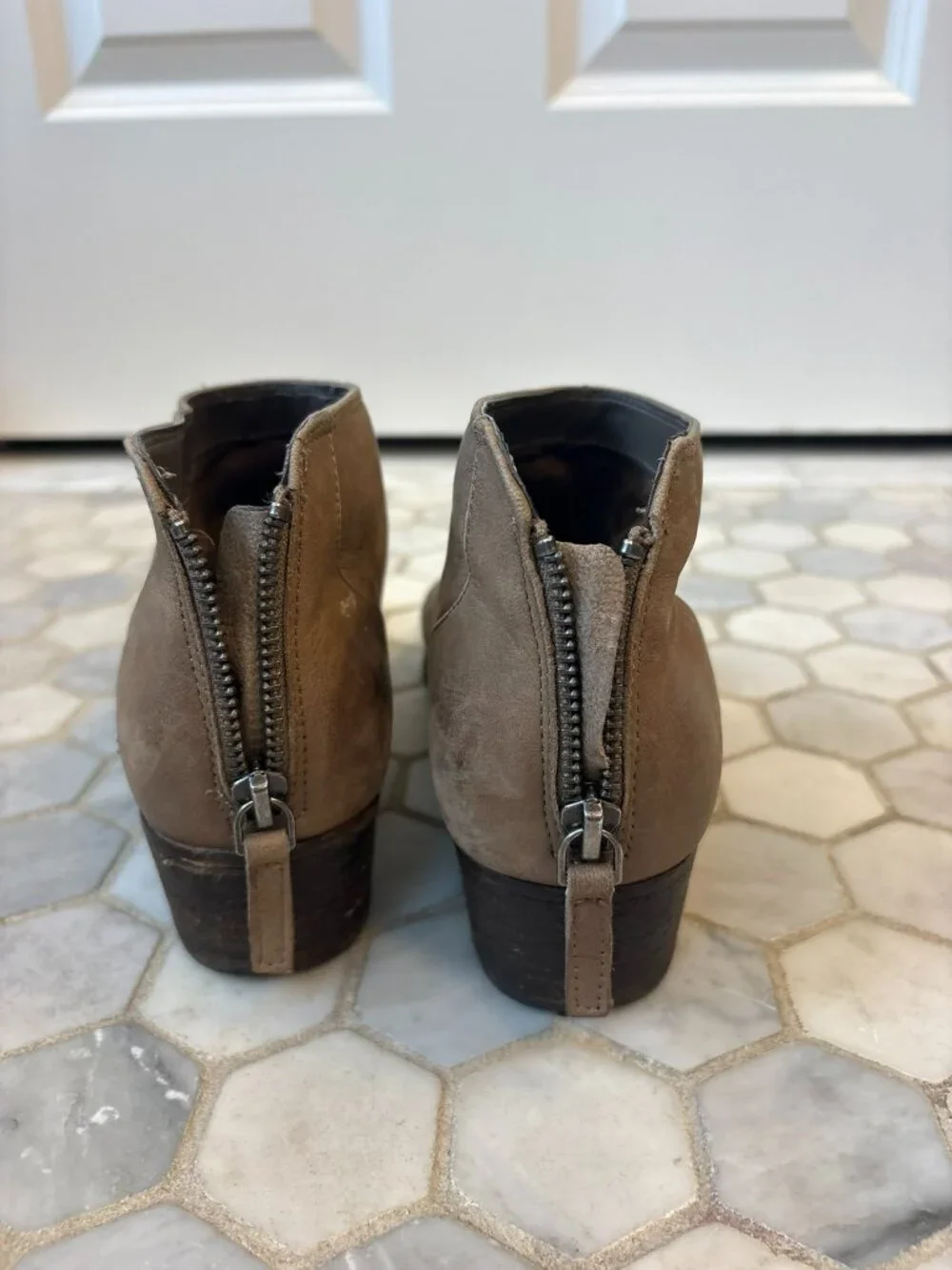 Blondo waterproof ankle booties featuring an almond-toe profile